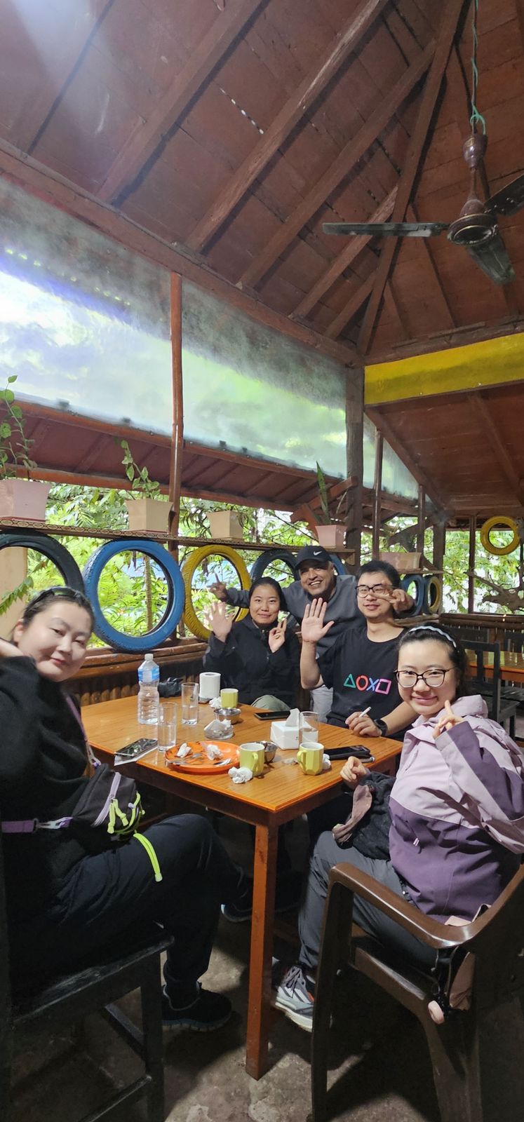 Guests sharing a meal at Hotel Tiger's Den
